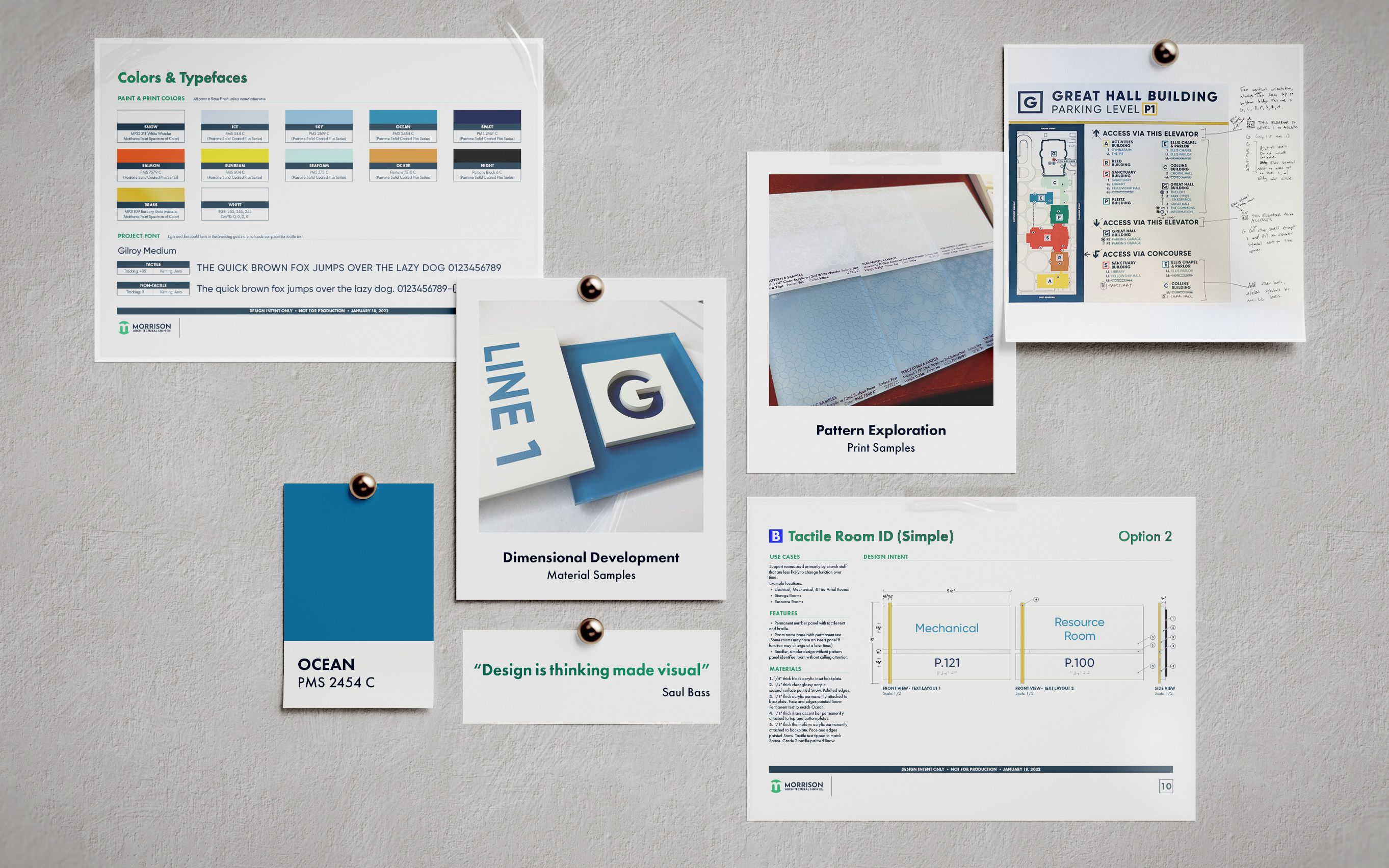 Several design development images are posted on a wall, including color mockups, preliminary spec drawings, and photos of fabricated samples.