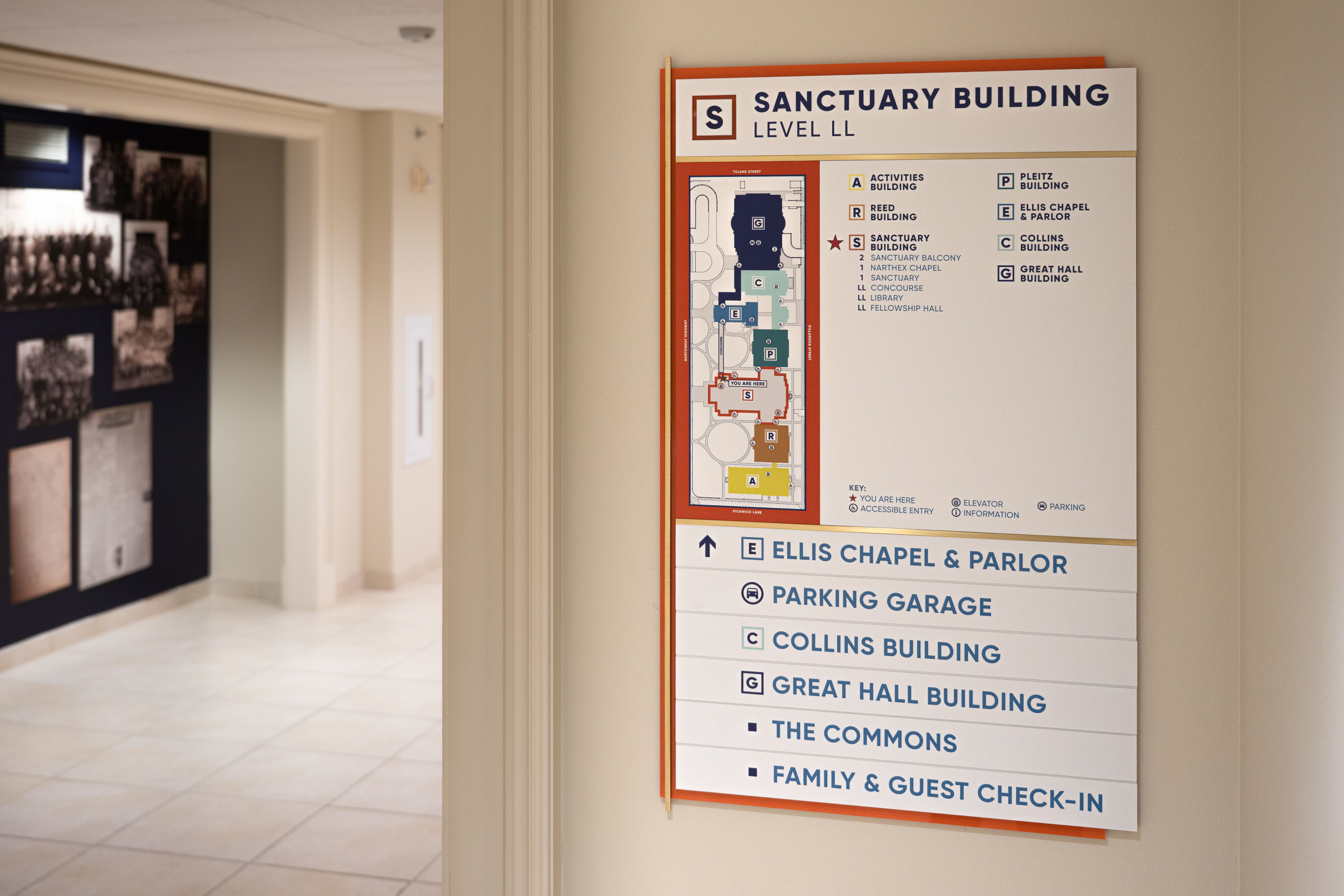 A sign with a map of a church building highlghts and points to various destinations.
